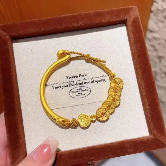 Unlock prosperity and good fortune with the 24k gold five emperor coins wealth bracelet