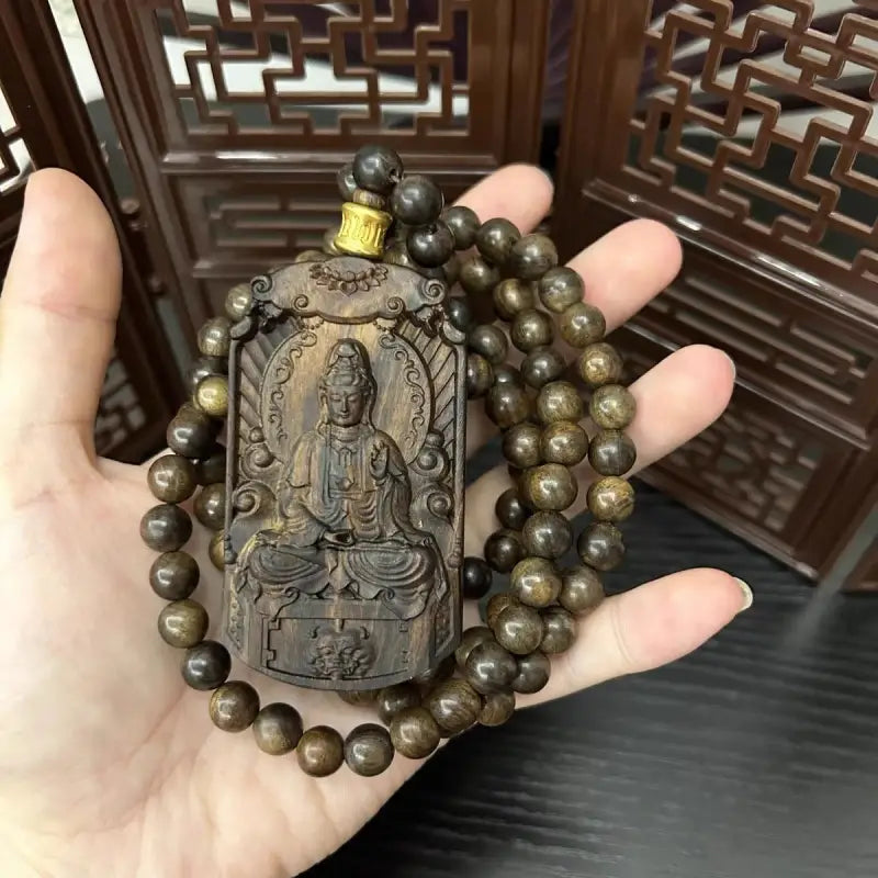 Agarwood lotus guanyin carving pendant