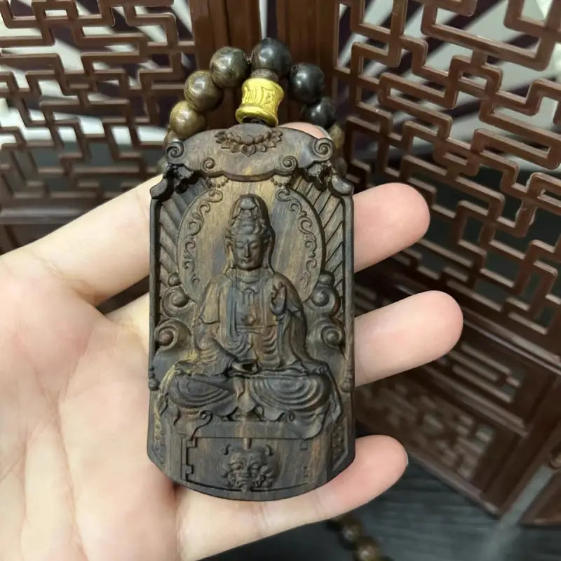 Agarwood lotus guanyin carving pendant