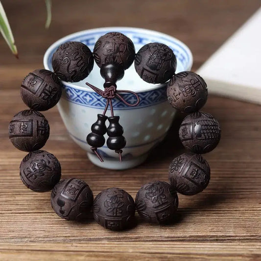 Thunderwood carved buddha beads bracelet - 12mm